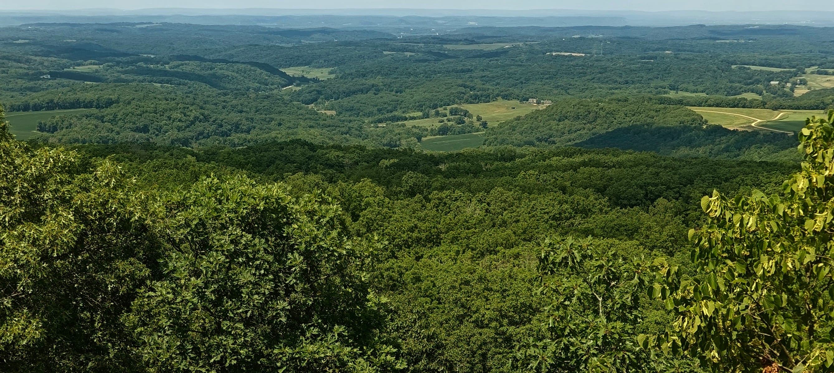 View over wooded ridges, valleys and patches of farmland from Blue Mound.