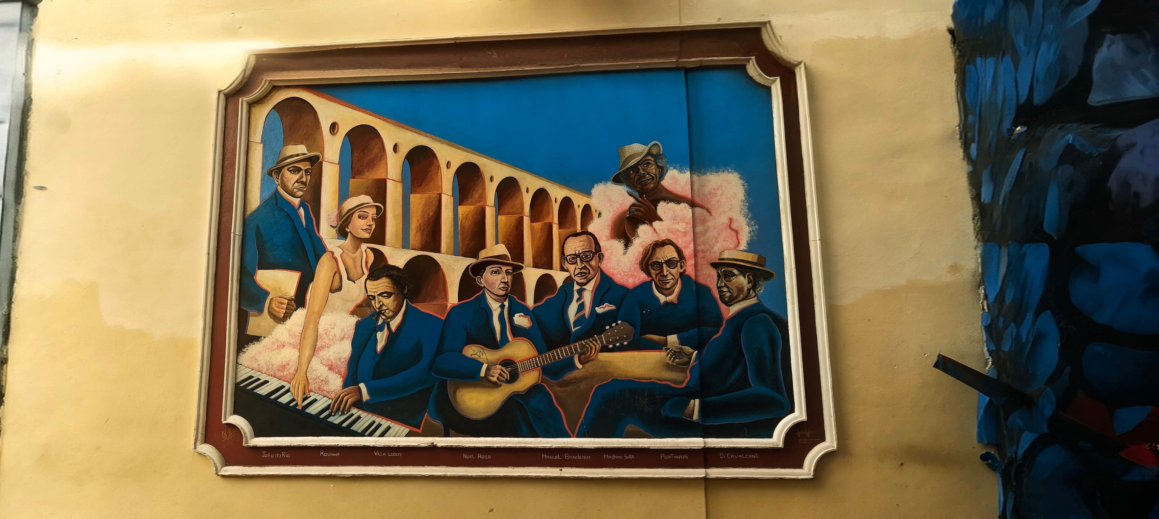 A colourful wall mural shows musicians and a row of arches in Rio de Janeiro.