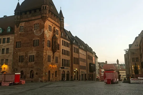 Nassauer Haus and surrounding buildings on Lorenzer Platz in soft early morning light.